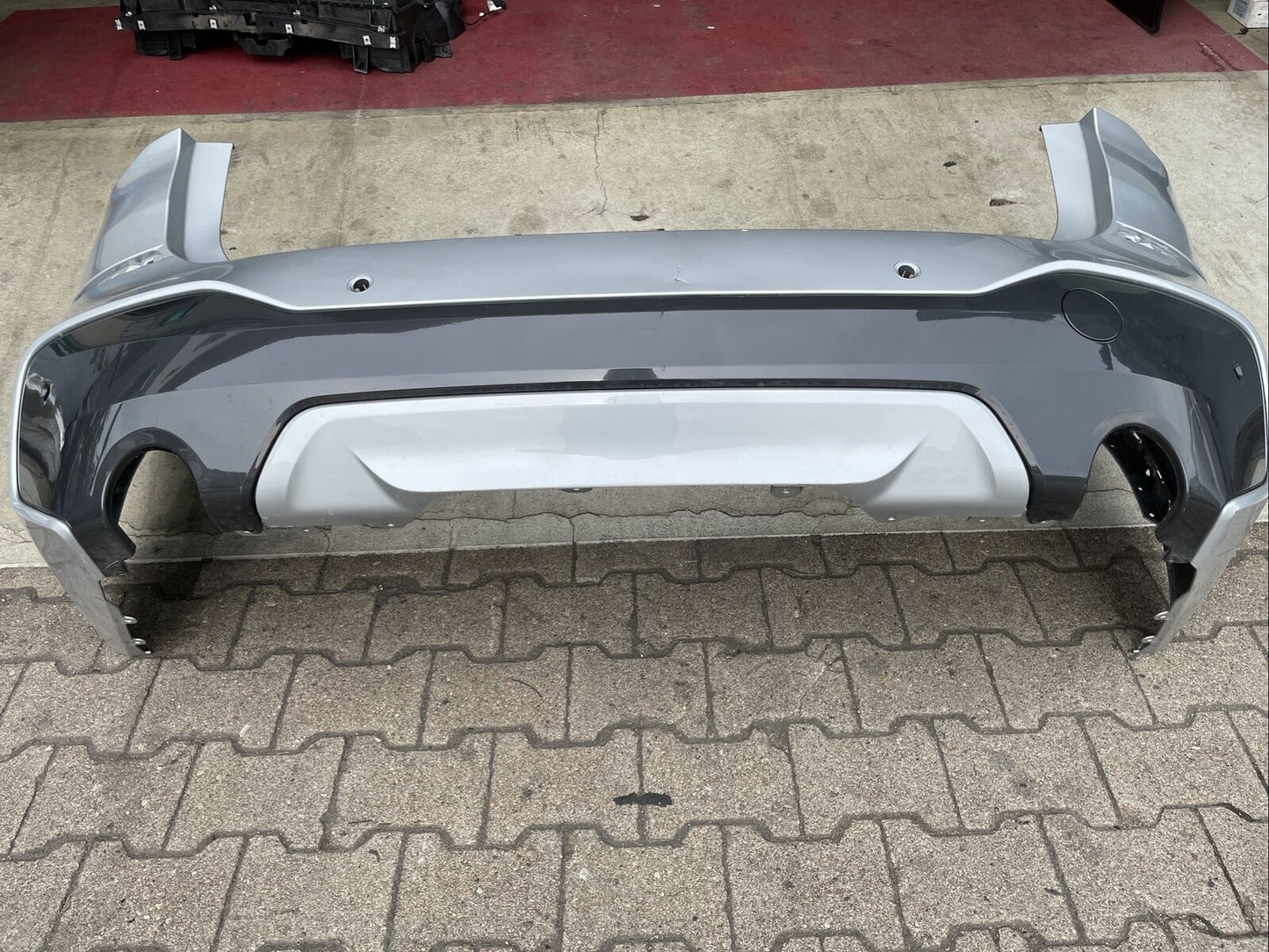 ORIGINAL BMW X1 F48 M PAKET NEUE MODELL Stoßstange PDC Diffusor 2 Flutig 8059877
